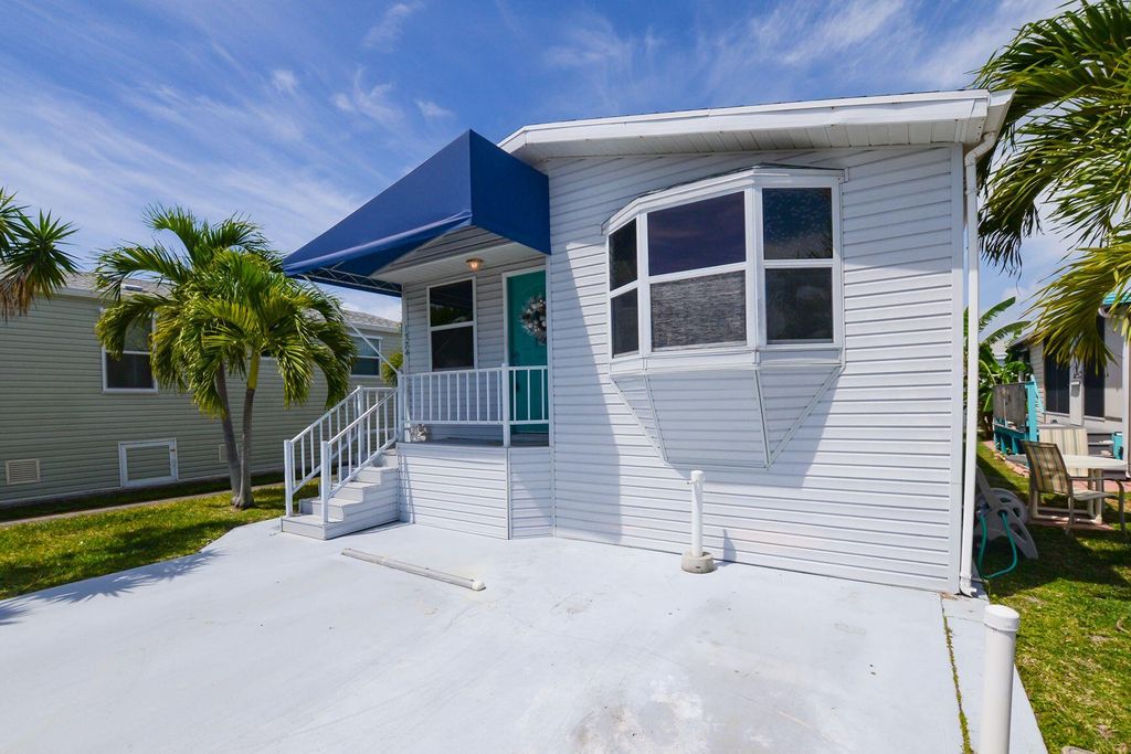 Photo of 1374 Nettles Boulevard, Jensen Beach, FL 34957 (MLS # R10797031)