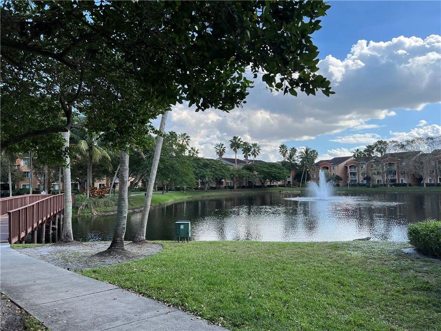 Amazing 1 Bedroom /1 Bathroom Corner unit on 2nd floor overlooking the beautiful lake with stunning water features. This unit is the perfect location right next door to Clubhouse, pool, and tennis courts. There is tile floor through out the unit. Currently leased to a long term tenant, living there 10+ years, rents are below market. Perfect opportunity for investors to raise rents and receive great CAP 8%, or live there and enjoy luxury living at it's finest across from the stunning new promenade at coconut creek shopping center and next to great schools.