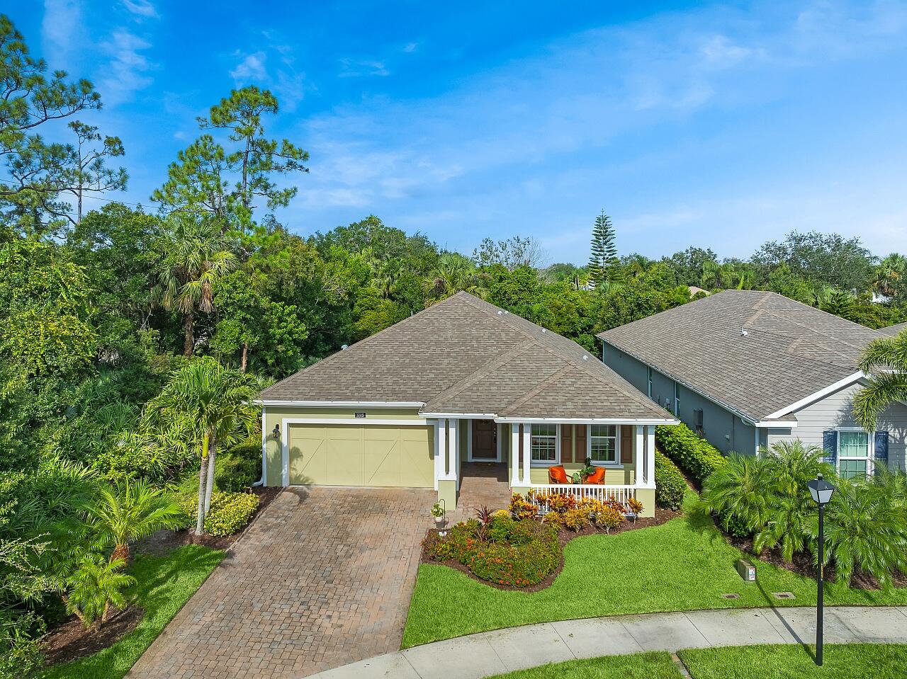 Harmony Reserve 55+ in Vero Beach! 125 acres of ''Old Florida'' charm blended with modern luxury! 2018 Holiday Homes Iris Plan offers 1,869 sq ft, 2 Bedrooms, 2 Bathrooms + Flex/Den/Bonus room w/ frosted glass privacy french door. Second Bedroom is private w/ its own bathroom for guests. Can be totally segregated sleeping quarters from Primary Suite on other side of home. Additional seller upgrades include new LVP flooring thru out, Crown molding, Impact windows, Whole-house generator hookup, and an irrigation well for free Lawn & garden watering. No Water use charges here! Custom Gourmet kitchen features luxury KitchenAid appliances--wall oven, microwave, GAS cooktop (its a Natural Gas Community!!) & dishwasher--PLUS custom cabinetry w/ pullouts for the chef or cook at home nights!