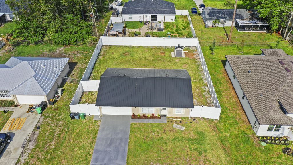 Photo of 4026 SW Kallen Street, Port Saint Lucie, FL 34953 (MLS # B26024769)