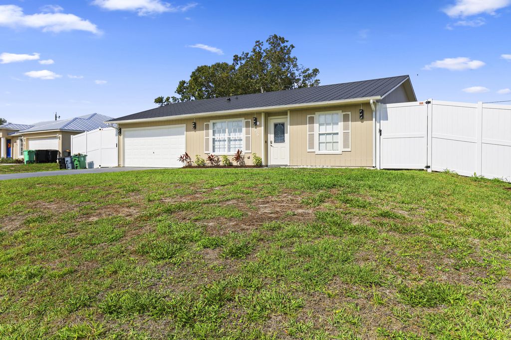 Photo of 4026 SW Kallen Street, Port Saint Lucie, FL 34953 (MLS # B26024769)