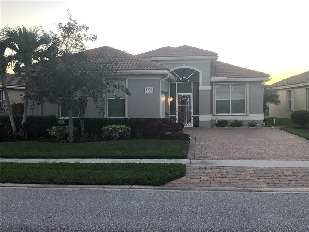 Photo of 4234 NW Oakbrook Cir, Jensen Beach, FL 34957 (MLS # F10318459)