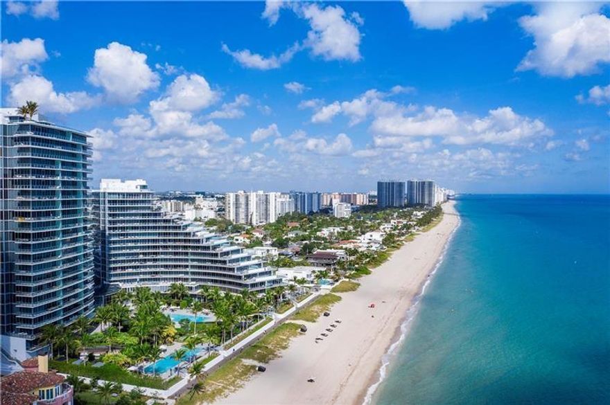 Experience stunning panoramic ocean views the moment you enter this exceptional 2 bed/2.5 bath luxury residence! One of the most coveted layouts at Auberge Beach Residences & Spa, this home is fully furnished and move-in ready with custom closets, porcelain and marble floors, designer lighting throughout, and a Control4 smart system managing lighting, climate, audio, and motorized blackout shades in bedrooms. The open-concept chef’s kitchen features sleek Italkraft white cabinetry, Wolf and Sub-Zero appliances, a gas range, and built-in coffee/cappuccino station. This residence shows like a model home—impeccable and stylish! Auberge Beach Residences & Spa offers resort-style living directly on 450 feet of pristine Atlantic Ocean beachfront.