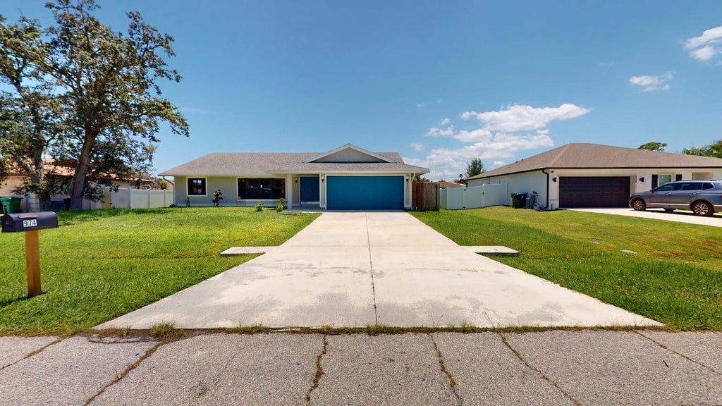 Photo of 974 SE BELFAST Avenue, Port Saint Lucie, FL 34983 (MLS # B26054695)