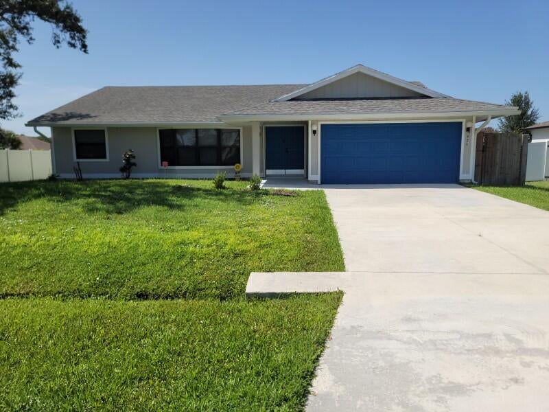 Photo of 974 SE BELFAST Avenue, Port Saint Lucie, FL 34983 (MLS # B26054695)