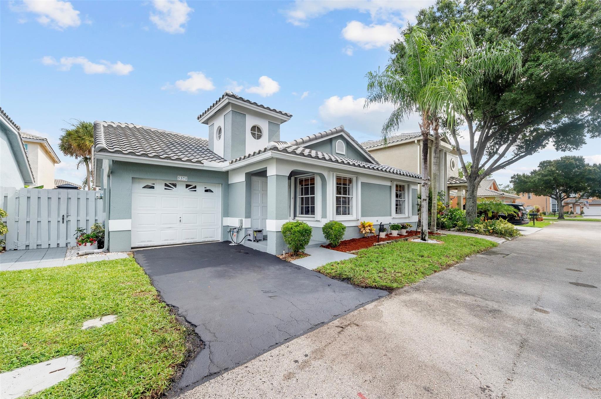 Great 3/2 single family home with a brand NEW ROOF in 2024 in the highly desirable neighborhood of Winston Park in Coconut Creek. Quiet street at the end of a one way cul-de-sac make it nice for kids to ride bikes & play. Easy walk to the private community pool to cool off. House opens up to a large great room & a split bedroom layout w/ a nice patio. Updates include low maintenance backyard with turf and new stone pavers, new exterior paint, & newer AC. 10 min walk on paved walking trails to Sabal Pines Park, tennis, baseball, soccer, yacht club & more. Perfect family neighborhood less than 1 mile to the Promenade at Coc Creek w/ movie theaters, indoor golf & shopping. Walking distance to top rated elementary school Winston Park. 1 Mile to Tradewinds park & stables for horse back riding.