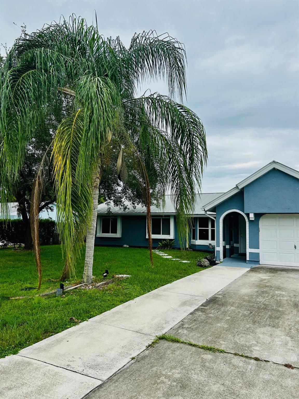 Charming 2 Bed / 1 Bath in the Heart of Port Saint Lucie - Modern, Cozy, and Move-In Ready!Welcome to your perfect retreat in the heart of Port Saint Lucie! This beautifully updated 2-bedroom, 1-bath home combines comfort, style, and convenience in one stunning package. Step inside and be greeted by a bright, open layout that feels both cozy and incredibly spacious--perfect for relaxing or entertaining.The sleek, modern kitchen is a true showstopper, featuring gleaming quartz countertops, stainless steel appliances, and ample cabinet space for all your cooking needs. Whether you're hosting dinner or enjoying a quiet night in, this space is designed to impress.Both bedrooms are generously sized with plenty of natural light, and the full bathroom is tastefully updated for a fresh feel.