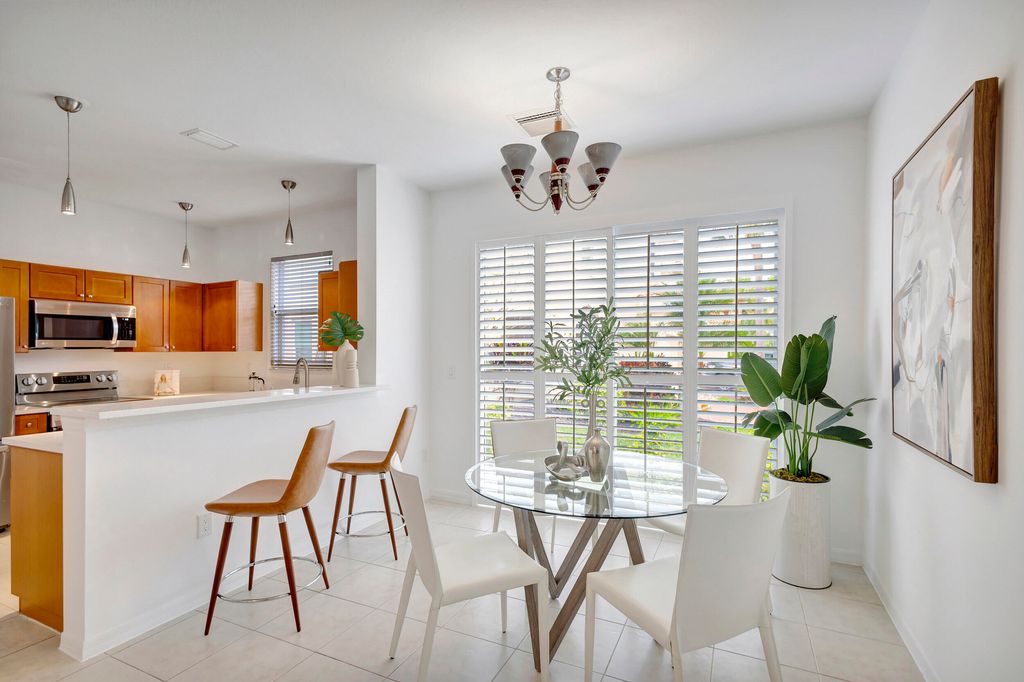 Photo of 6110 Seminole Gardens Circle, Riviera Beach, FL 33418 (MLS # R10942138)