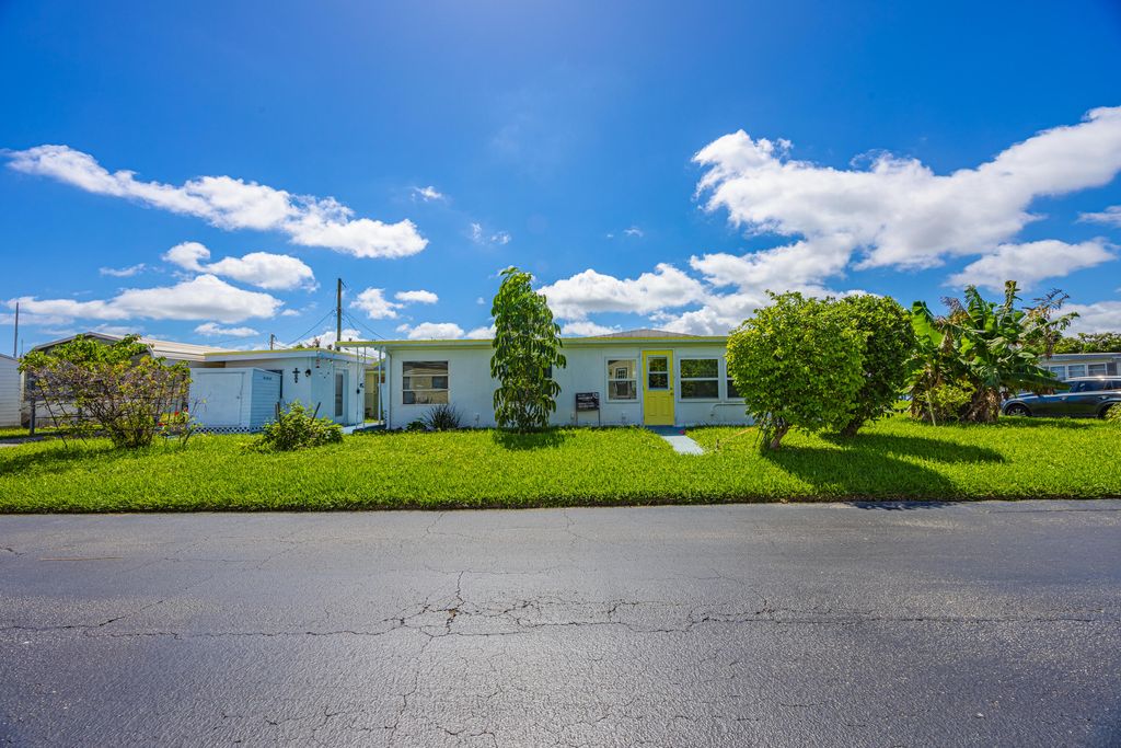 Photo of 8904 Palm Street, Boynton Beach, FL 33436 (MLS # R11128843)