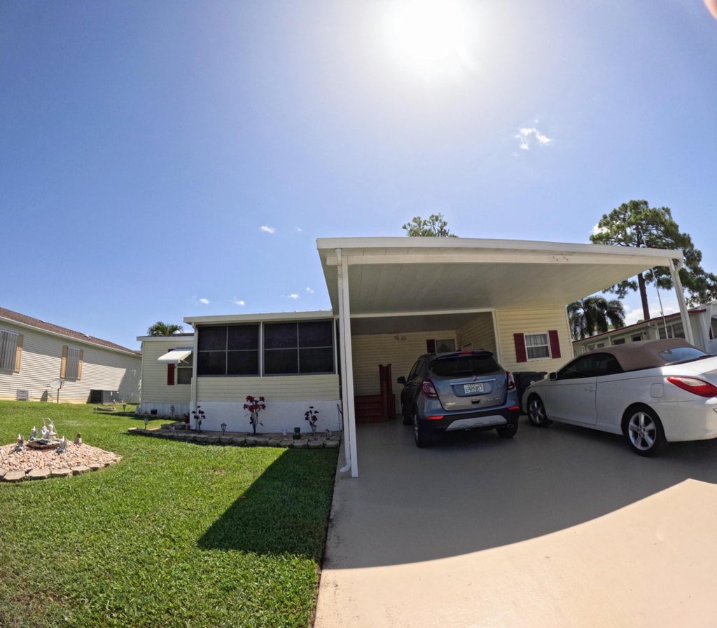 Photo of 6280 Cypress Lane, Atlantis, FL 33462 (MLS # B26069312)