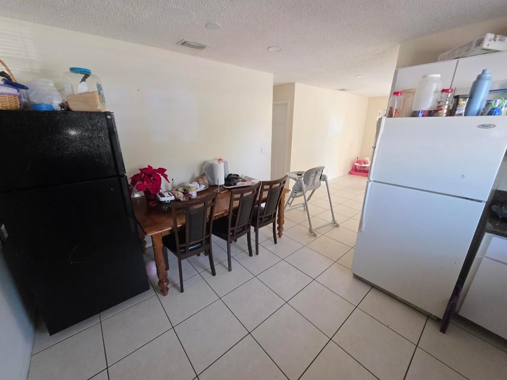 Photo of 1024 Mcintosh Street, West Palm Beach, FL 33405 (MLS # R11150739)