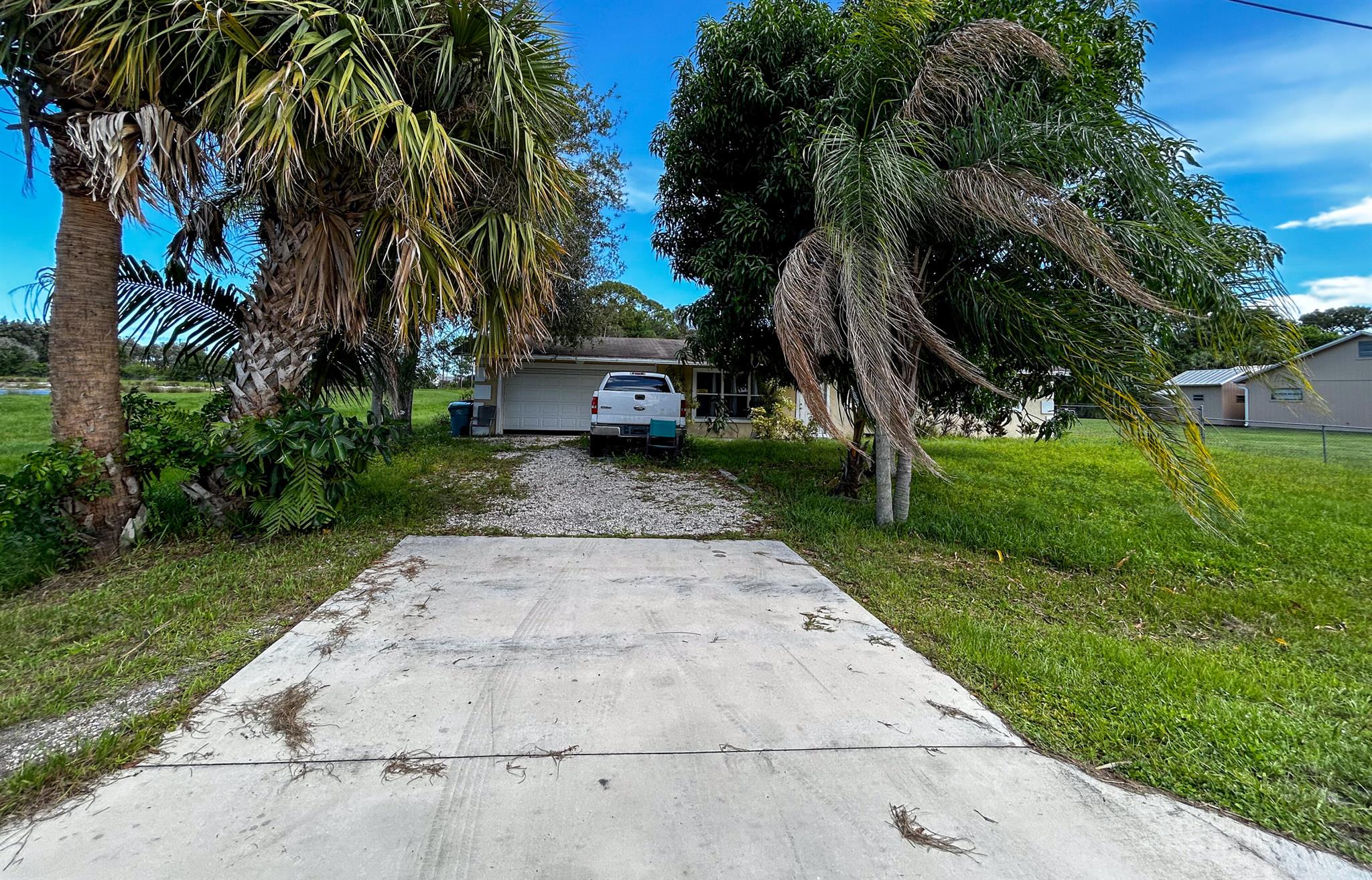 Fixer-Upper on Oversized Lot Near US-1! This CBS 3 bedroom, 2 bath, 2-car garage home offers 1,248 sq. ft. of living space on an oversized 13,504 sq. ft. lot with room for outdoor use or future improvements. Conveniently located near US-1, shopping, dining, and beaches, the property is in need of a complete renovation and is best suited for investors, contractors, or buyers seeking a full rehab project. Sold strictly AS-IS, Cash Only.
