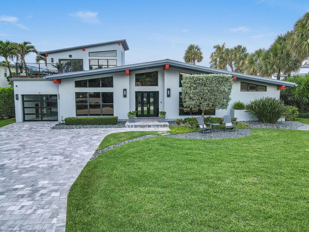 Photo of 25 Ocean Drive, Jupiter Inlet Colony, FL 33469 (MLS # R10936020)