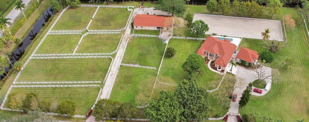 Photo of 3950 Horse Trail, Loxahatchee, FL 33470 (MLS # R11150883)