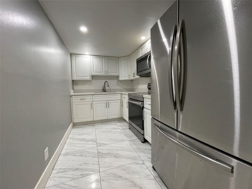 Best Priced 3/2 in the area!! Newly renovated bathrooms and kitchen with stainless steel appliances, soft closed
cabinets. Laminate flooring. Brand new oversize screened balcony, New roof, New Hurricane Impact windows and
sliding door, New AC & water heater & New elevator, Plenty of guest parking. Adjacent to community pool in this
quiet beautiful community. A+ school district, great space for entertaining and so much to do in the area. Don't miss
this opportunity to own your turn key unit