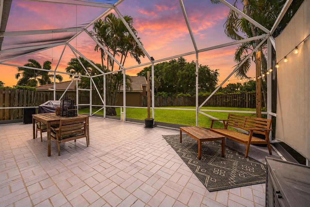 Photo of 7410 Ashley Shores CIR, Greenacres, FL 33467 (MLS # B26031121)