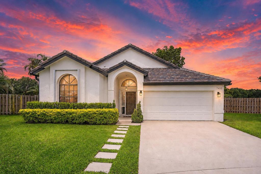 Photo of 7410 Ashley Shores CIR, Greenacres, FL 33467 (MLS # B26031121)