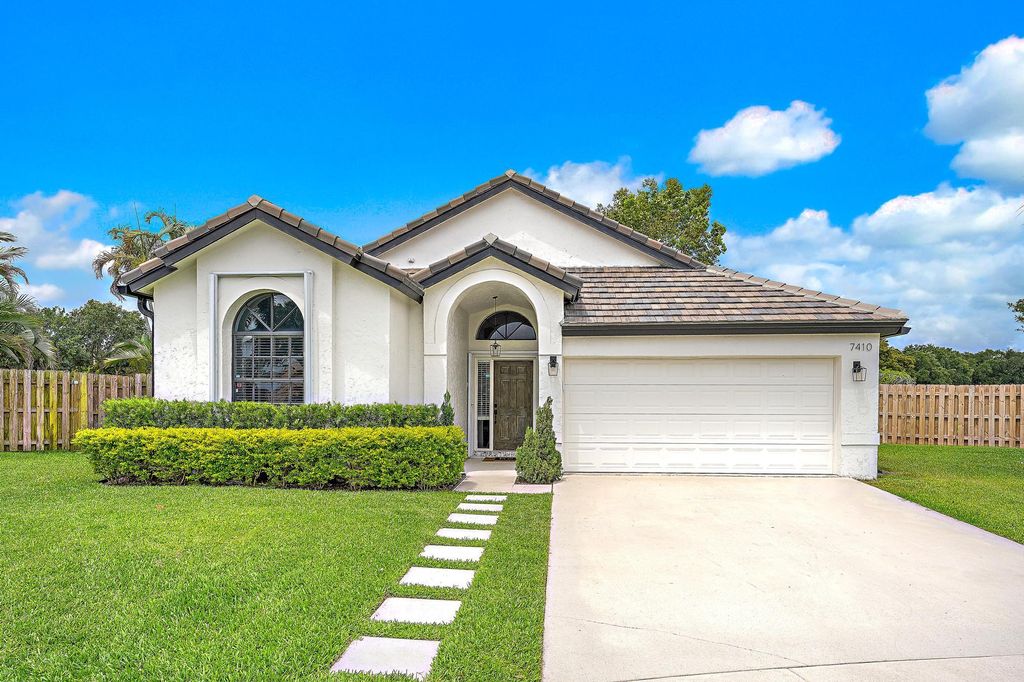 Photo of 7410 Ashley Shores Circle, Lake Worth, FL 33467 (MLS # B26031121)