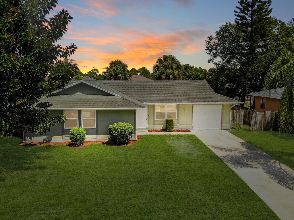 Photo of 1457 SW Flounder Lane, Port Saint Lucie, FL 34953 (MLS # R10921800)