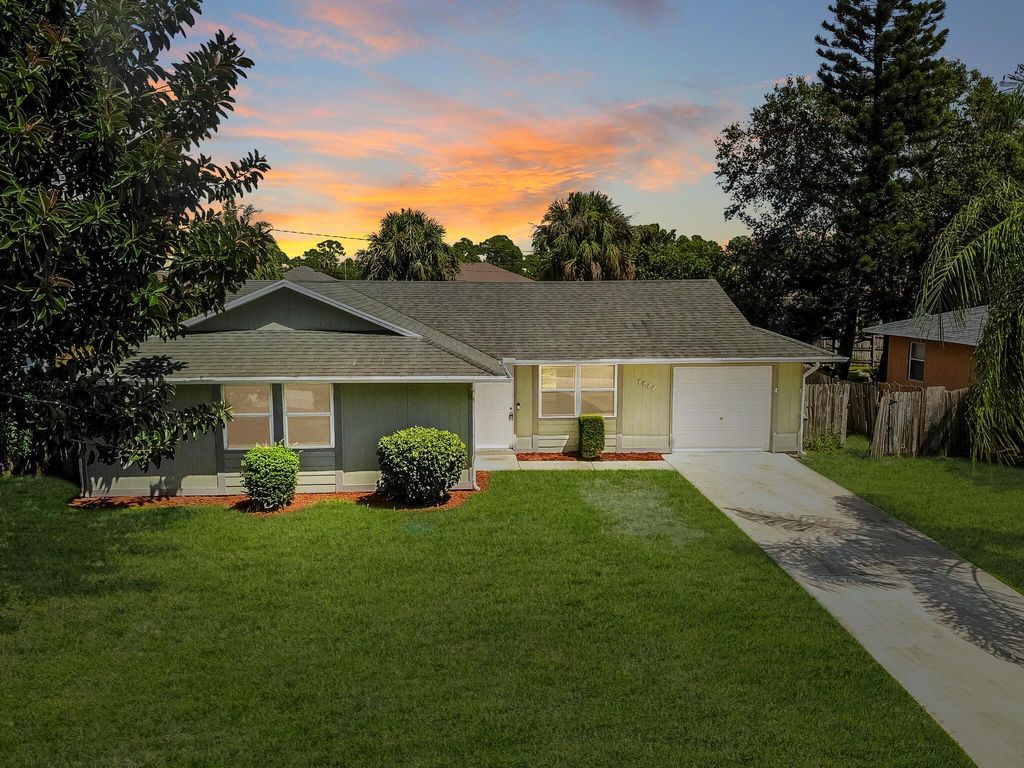 Photo of 1457 SW Flounder Lane, Port Saint Lucie, FL 34953 (MLS # R10921800)