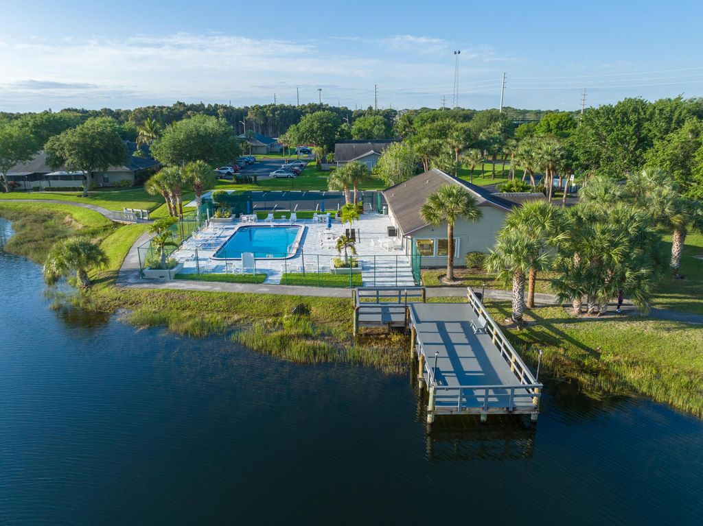 Photo of 4041 NW Cinnamon Tree Circle, Jensen Beach, FL 34957 (MLS # B26010132)