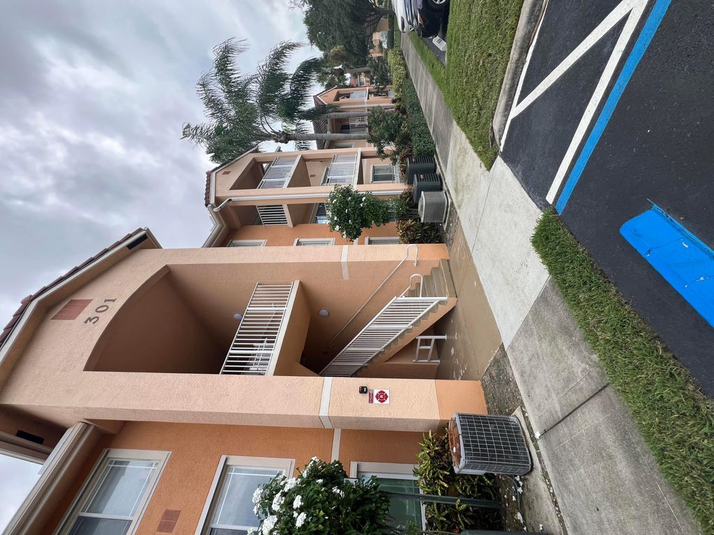 Photo of 301 SW Palm #205, Port Saint Lucie, FL 34986 (MLS # B26001053)