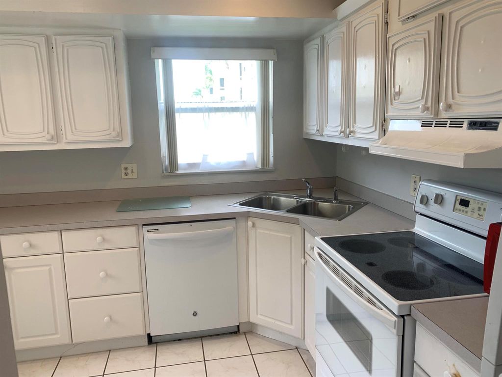 Photo of 3 Colonial Club Drive #100, Boynton Beach, FL 33435 (MLS # R10959234)