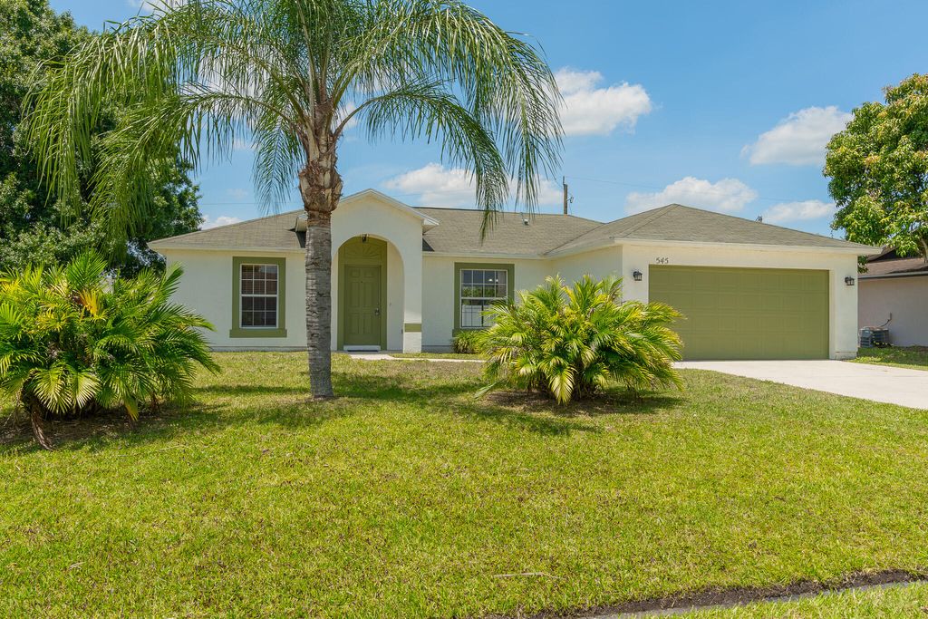 Photo of 545 SW Buswell Avenue, Port Saint Lucie, FL 34983 (MLS # R11093515)