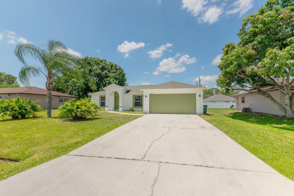 Photo of 545 SW Buswell Avenue, Port Saint Lucie, FL 34983 (MLS # R11093515)