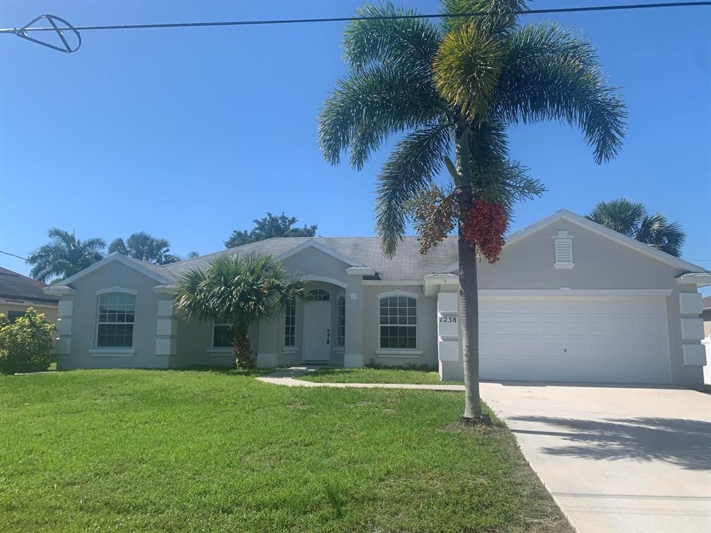 Photo of 1238 SW Medina Avenue, Port St Lucie, FL 34953 (MLS # R10886491)