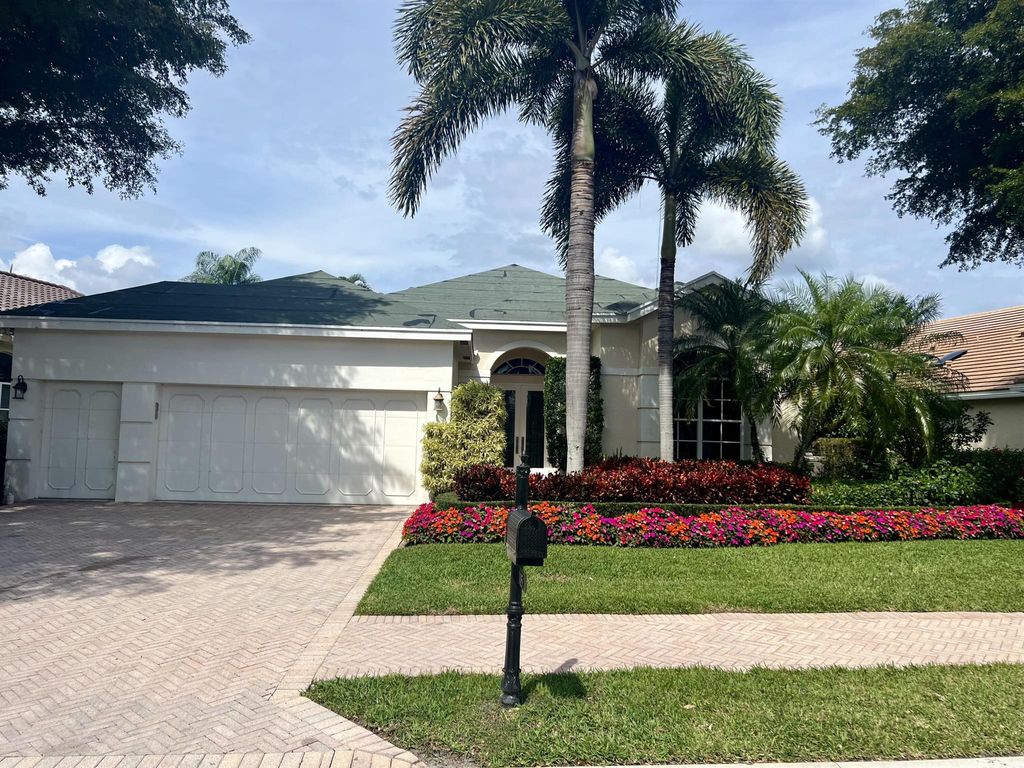 Photo of 115 Banyan Isle Drive, Palm Beach Gardens, FL 33418 (MLS # R10964211)