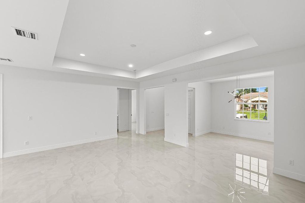 Photo of 4219 SW Utterback Street, Port Saint Lucie, FL 34953 (MLS # R11128882)