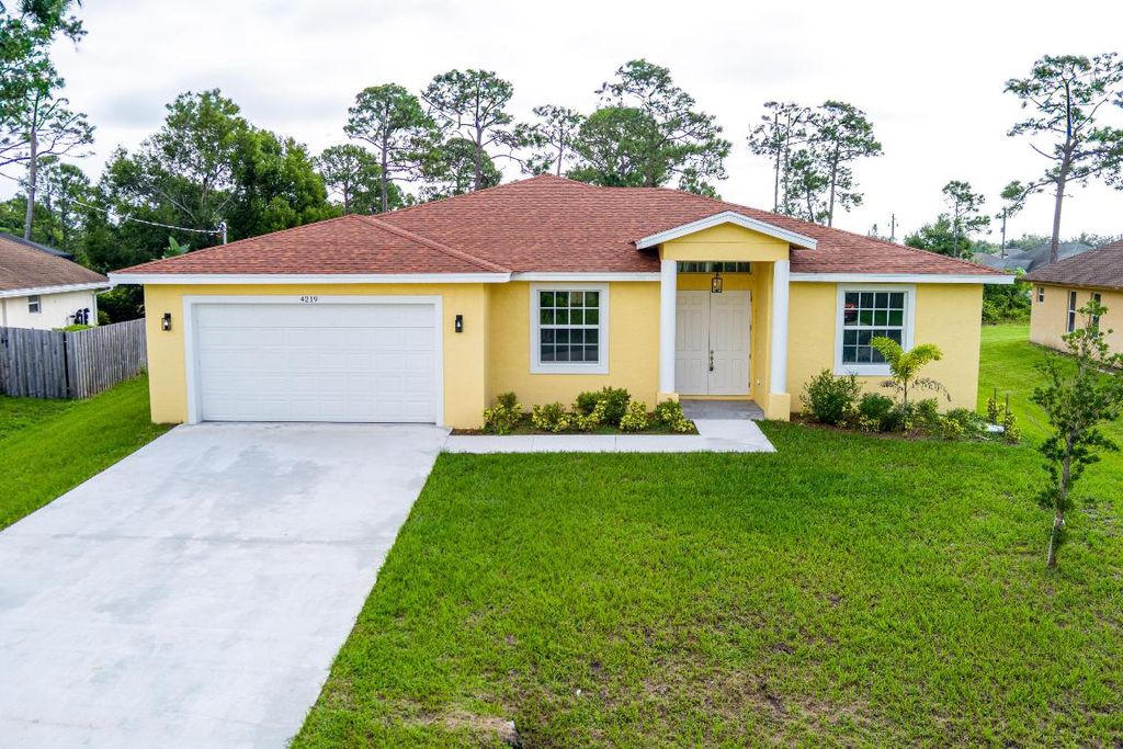 Photo of 4219 SW Utterback Street, Port Saint Lucie, FL 34953 (MLS # R11128882)