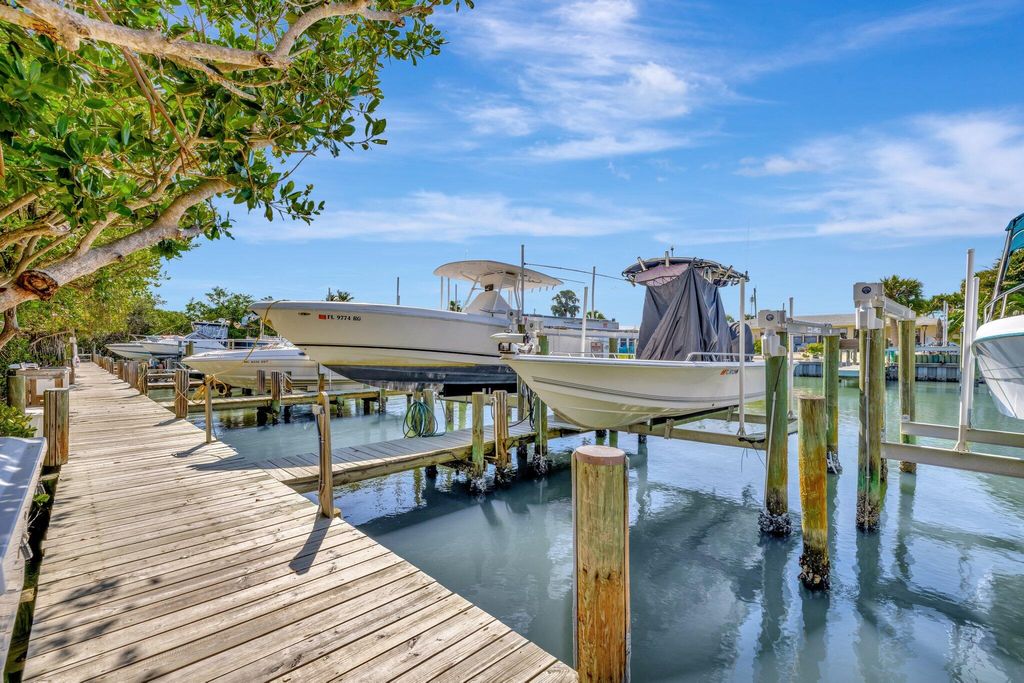 Photo of 209 River Walk, Hutchinson Island, FL 34949 (MLS # R11073539)