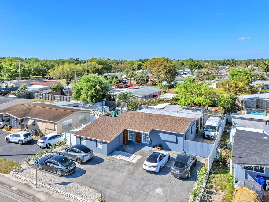 Prime Investment Opportunity! This 2BR/1BA home plus den offers both comfortable living and excellent income potential, with an estimated rental projection of up to $62,400 per year. Renovated with over $100,000 in improvements, including a newer roof (2021), Newer A/C compressor, and septic system serviced within the past year. Situated on a 6,764 SF lot and elevated approximately 3 feet above street level. Features include a Florida room, utility room, porch, asphalt driveway, patio areas, and ample parking. Spacious backyard ideal for entertaining or relaxing. Conveniently located near schools, shopping, dining, entertainment, and major roadways.