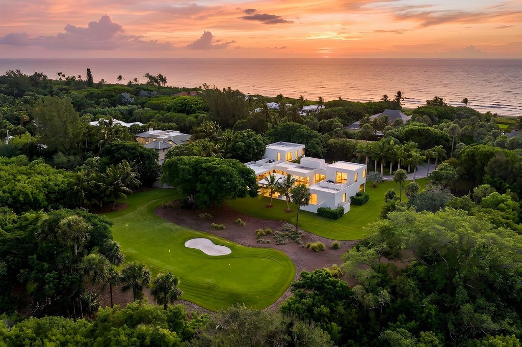 Photo of 12 N Beach Road, Jupiter Island, FL 33455 (MLS # B26022643)