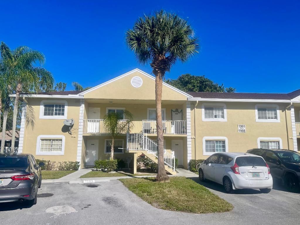 Photo of 1905 Palm Beach Trace Drive, Royal Palm Beach, FL 33411 (MLS # R11154252)