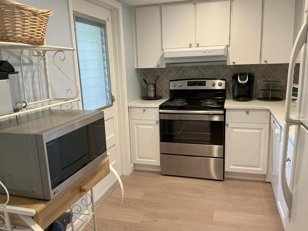 Photo of 5520 Tamberlane 208 Circle #208, Palm Beach Gardens, FL 33418 (MLS # R11086045)