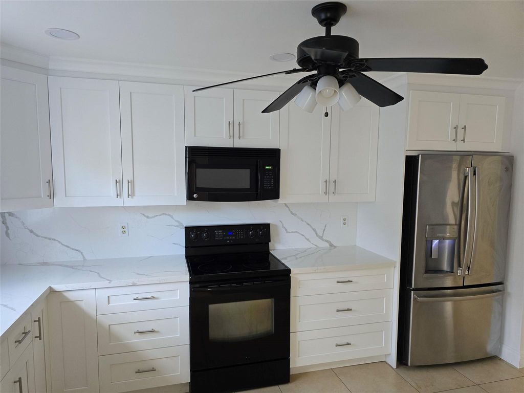 Photo of 7586 Andorra Place, Boca Raton, FL 33433 (MLS # F10485253)