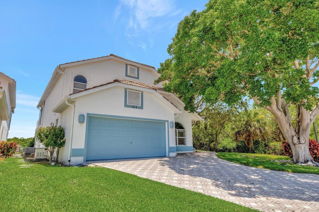 Photo of 163 Pepper Lane, Jensen Beach, FL 34957 (MLS # R11112153)
