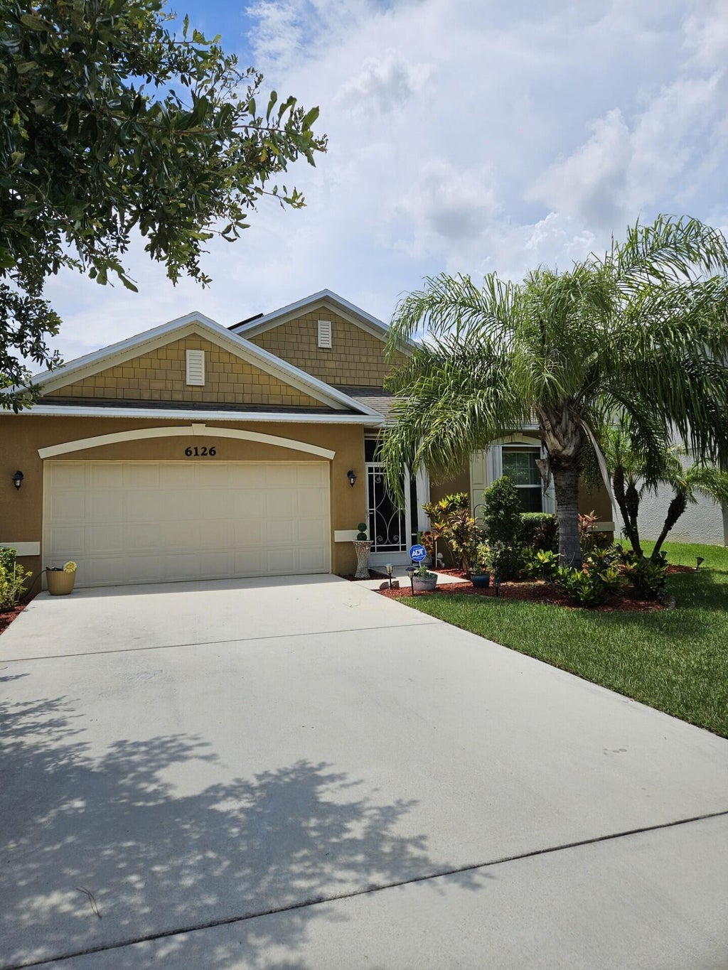Photo of 6126 NW Wild Cotton Way, Port Saint Lucie, FL 34986 (MLS # B26058988)
