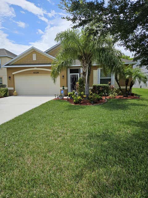 Photo of 6126 NW Wild Cotton Way, Port Saint Lucie, FL 34986 (MLS # B26058988)