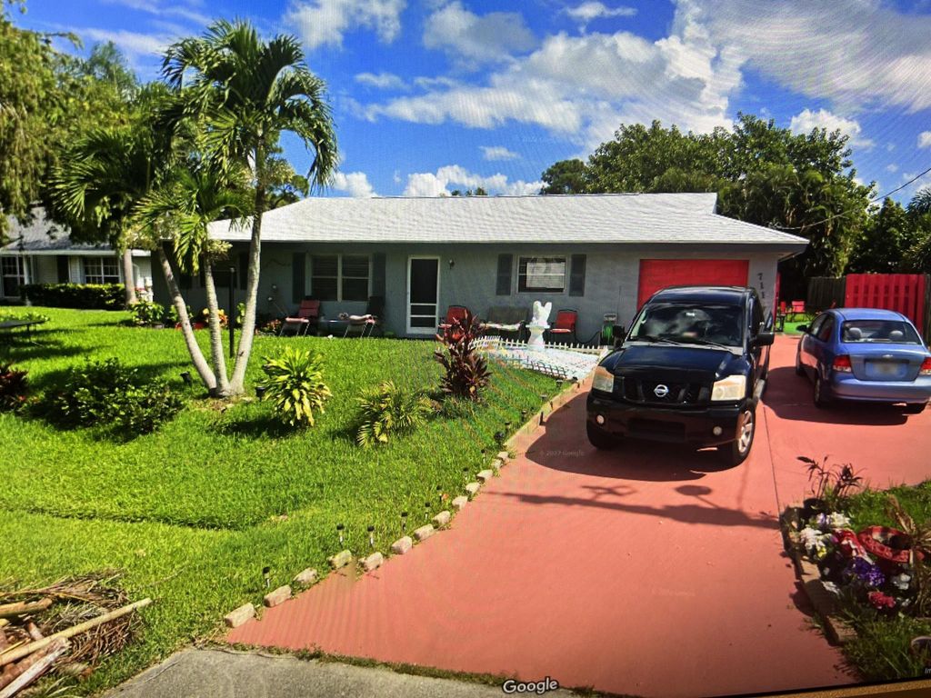 Photo of 711 SE Voltair Terrace, Port St Lucie, FL 34983 (MLS # R10923687)