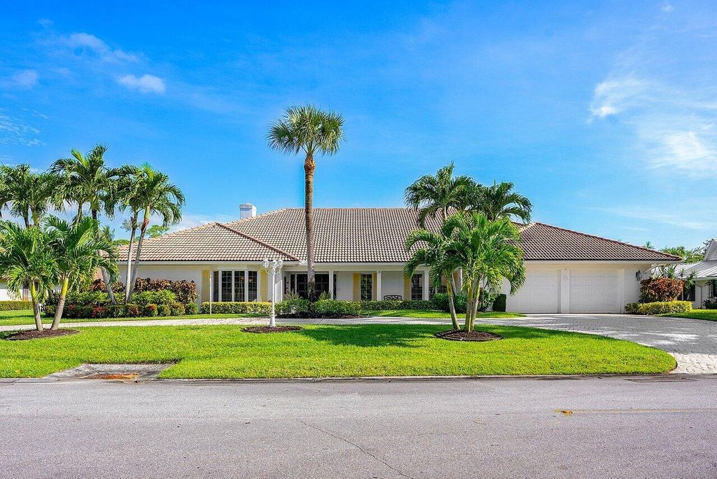 Photo of 533 S Country Club Drive, Atlantis, FL 33462 (MLS # R10928153)