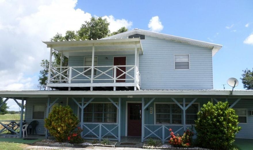 Welcome to this spacious and serene 3-bedroom, 2-bathroom two-story home located directly across from the Nubbin Slough Boat Launch and the Lake Okeechobee Scenic Trail. Designed for outdoor enthusiasts and those who appreciate peaceful living, this home offers the ideal blend of comfort, space, and access to nature.Step inside to a large, open-concept living area perfect for relaxing or entertaining. The home features an in-unit washer and dryer, and a rear second-story balcony with sweeping views of open pastures and natural wildlife--your own private overlook to unwind after a long day on the water.Situated in a highly desirable location, this home provides immediate access to boating, fishing, biking, and walking trails, while still being just minutes from shops/amenities