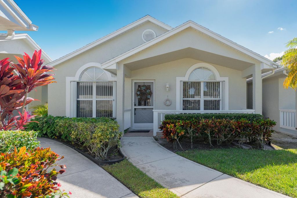 Photo of 1204 NW Lombardy Drive, Port St Lucie, FL 34986 (MLS # R10931153)