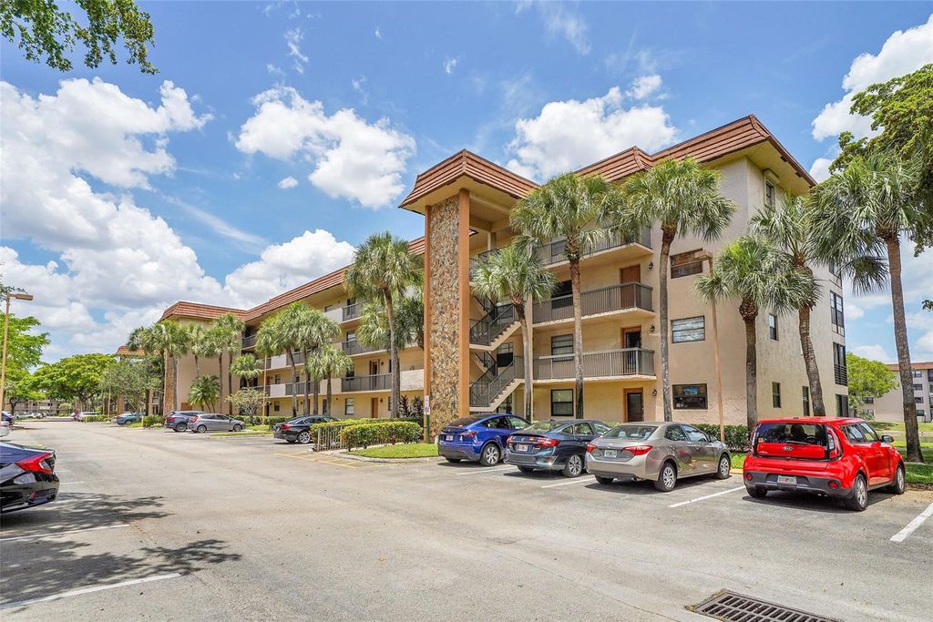 Photo of 4950 E Sabal Palm Blvd #302, Tamarac, FL 33319 (MLS # F10539791)