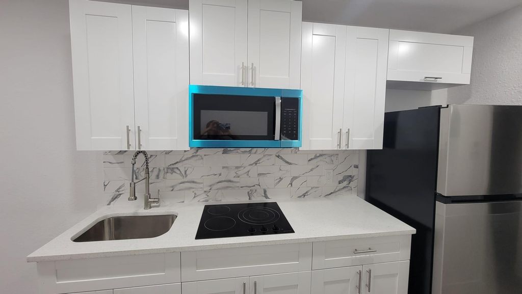 Photo of 618 SW 14th Terrace #4, Fort Lauderdale, FL 33312 (MLS # F10555106)