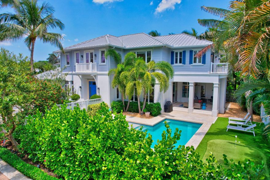 An exceptional opportunity to experience both luxury and location just in time for the Season. This Bermuda-inspired residence, set on a approximate 12,730 square foot lot, masterfully blends opulence with convenience. This 4-bedroom, 4-full bathroom, 2 half-bathroom, expansive 3-car garage provides ample space for guests, and your lifestyle. Located just one block from the Atlantic Ocean, you'll enjoy stunning sunrises and the pristine sands of Delray Beach. In a mere two-minute golf cart ride, immerse yourself in the vibrancy of Downtown Delray, where a dynamic nightlife, upscale shopping, and a wide variety of dining options await. Stroll down Atlantic Avenue, lined with charming boutiques and live music venues. When the day winds down, retreat to your peaceful residence, quietly tucked at the end of a brick-laden cul-de-sac. Whether lounging poolside or perfecting your putt on the lush green, relaxation is at your fingertips. After a day of leisure, gather around the roaring fire under the covered patio, perfect for creating lasting memories.

1211 Hammond is a masterpiece designed by renowned architect Randall Stofft. With an open floor plan and soaring vaulted ceilings, the home exudes sophistication. A seamless combination of marble, limestone and wood finishes brings timeless elegance, while ensuring privacy and comfort. This residence defines coastal living.

For those who travel, convenience is key. Palm Beach International is just a 20-minute drive north, while Fort Lauderdale-Hollywood International Airport is 35 minutes south, making it easy for family and friends to visit, pending your approval of course.