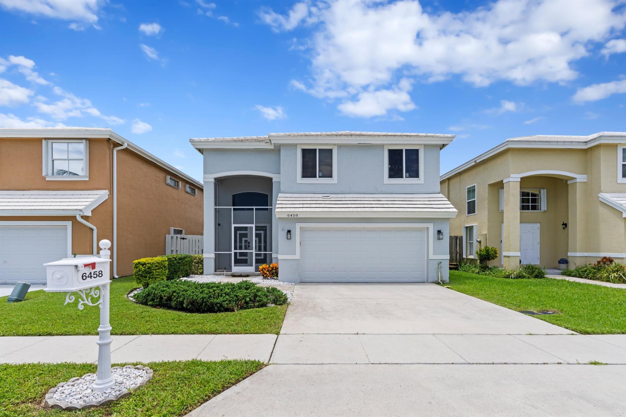 Discover this stunning 5-bedroom, 2.5-bath home in Margate's secure Coral Bay! This beautiful residence features new 100% impact windows and doors, a beautifully updated kitchen, and new flooring throughout. Experience serene wide lake views from your private, screen-enclosed pool. Coral Bay offers an abundance of amenities including three community pools, and the vast scenic Peninsula Island Park. The main clubhouse features a boat ramp for non-motorized boats to access the lake, plus a substantial tot lot for kids and ample guest parking. Enjoy the convenience of being just minutes from Coral Springs' best shopping amenities and having easy access to the Turnpike. This home blends security, comfort, and elegance perfectly. Come see the best of Coral Bay!
